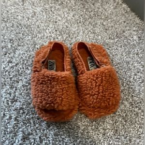 Orange sherpa sandals